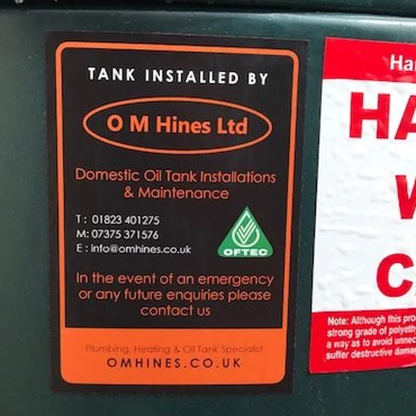 O M Hines Ltd OFTEC registered installer sticker on a newly fitted oil tank